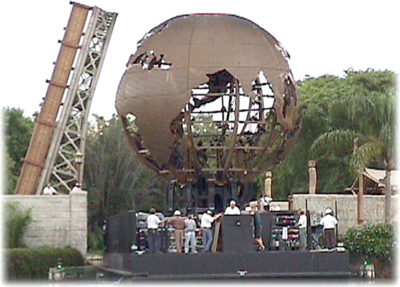 The completed Earth Globe on its barge at World Showcase Lagoon