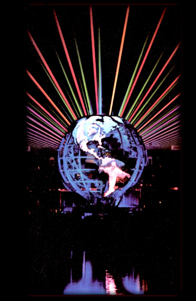The Earth Globe opened for the finale, torch raised, surrounded by light beams